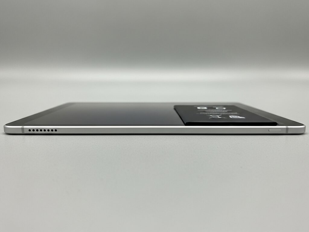 Same tablet with a fresh battery installed and the frame realigned flush