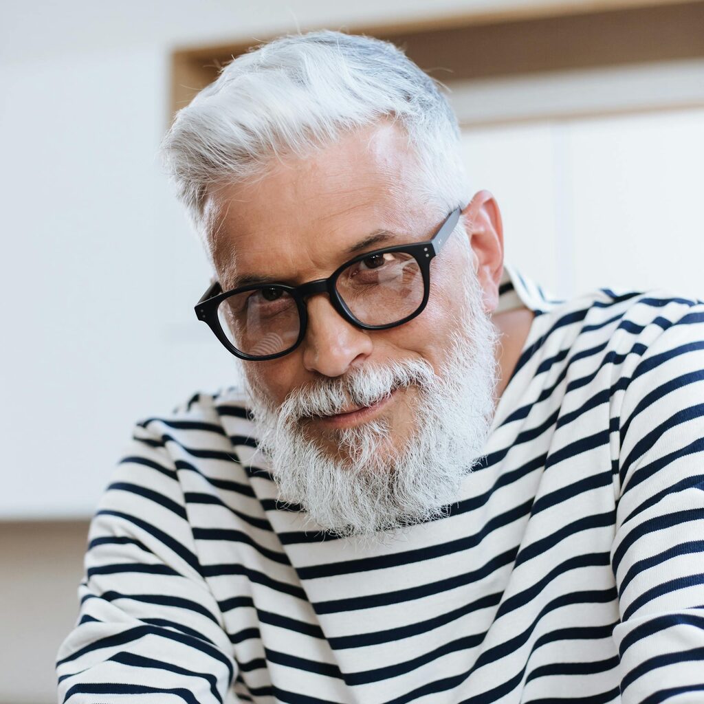 Portrait of a senior shop owner looking at the camera