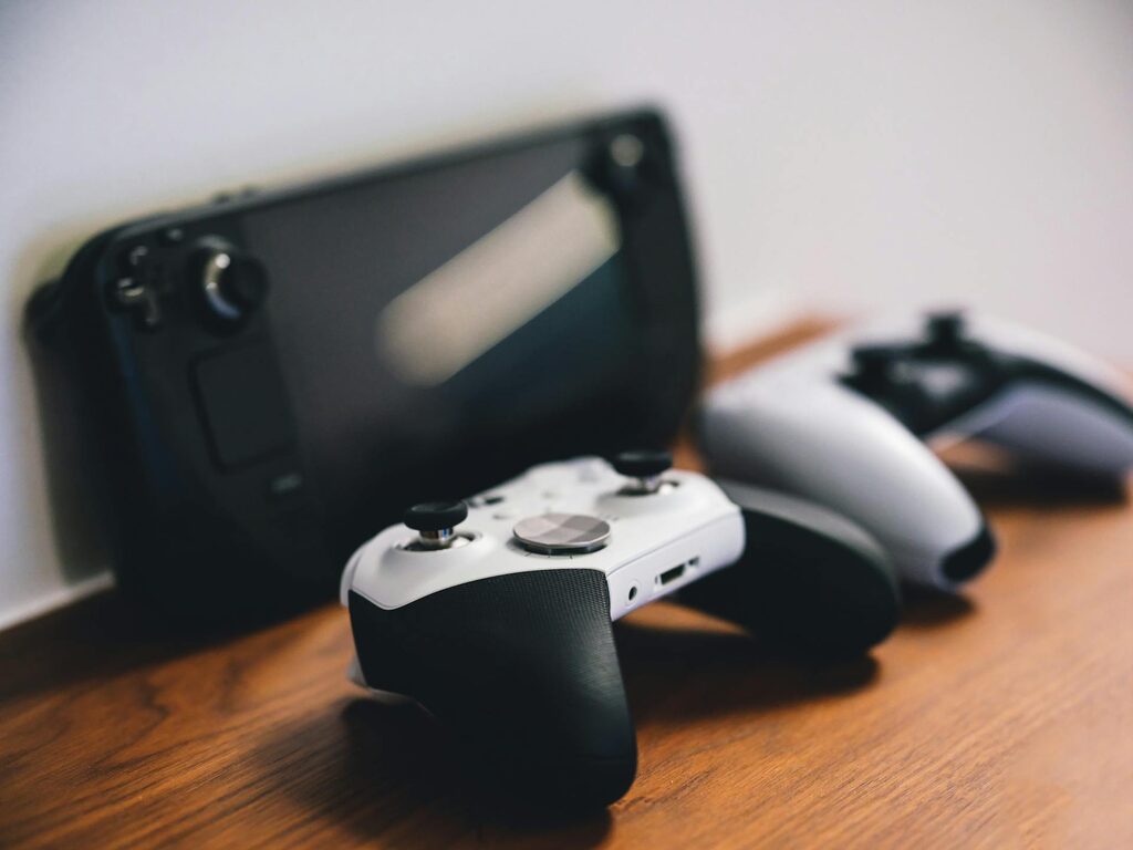 Xbox controller and console set up on a workbench
